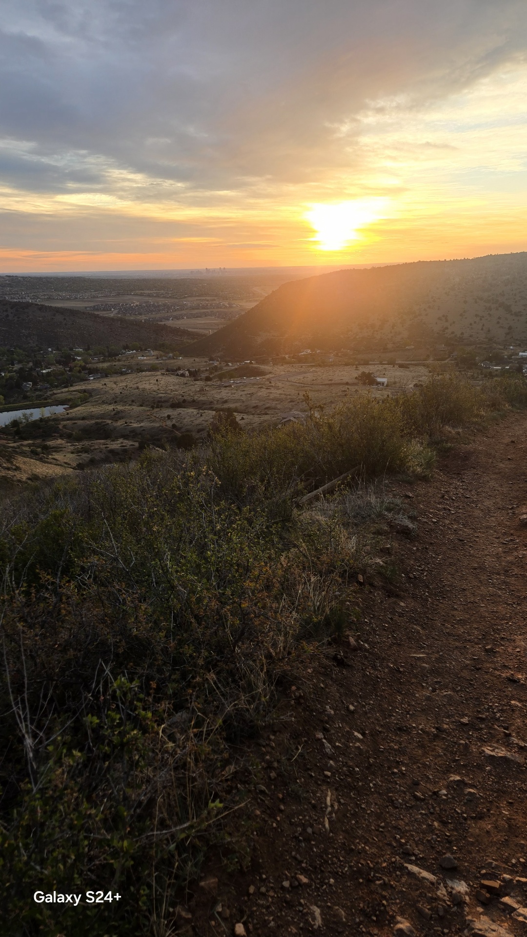 Sunrise over Denver from Mt. Falcon trail